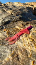 Shore Squid Colourshift soft lure on rocks